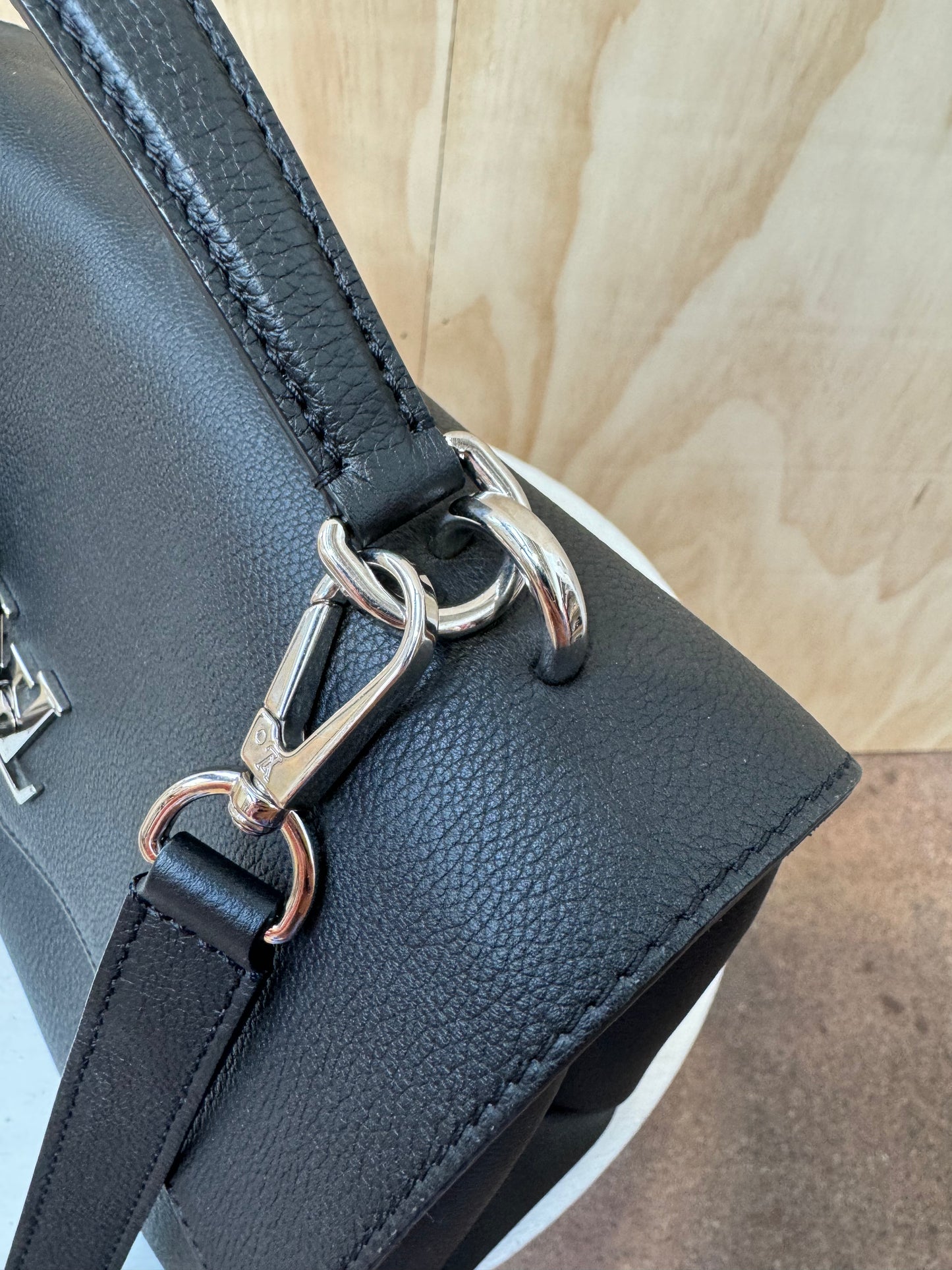 LOUIS VUITTON MYLOCKME LEATHER HANDBAG